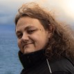 Tomek C.